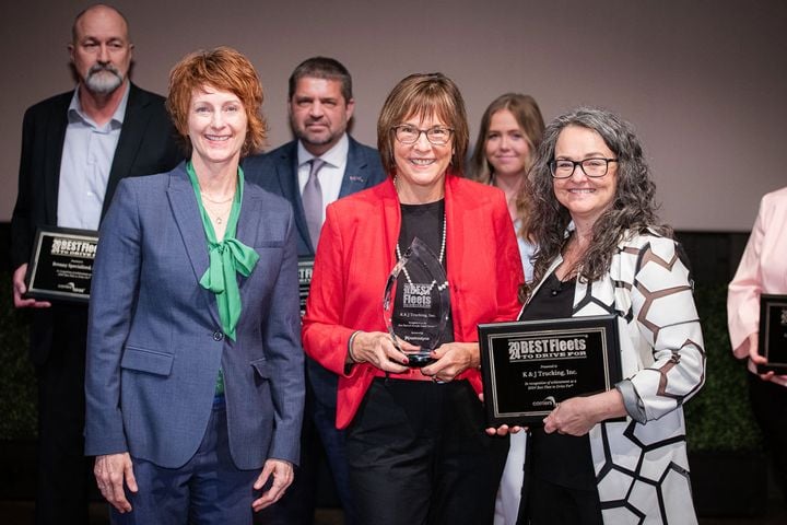 Shelley Schipper, president of K&J Trucking, center, receives Stratosphere award from Jane Jazrawy, CarriersEdge CEO, right. At left is Heather Engen of Netradyne, which sponsored the award. -...